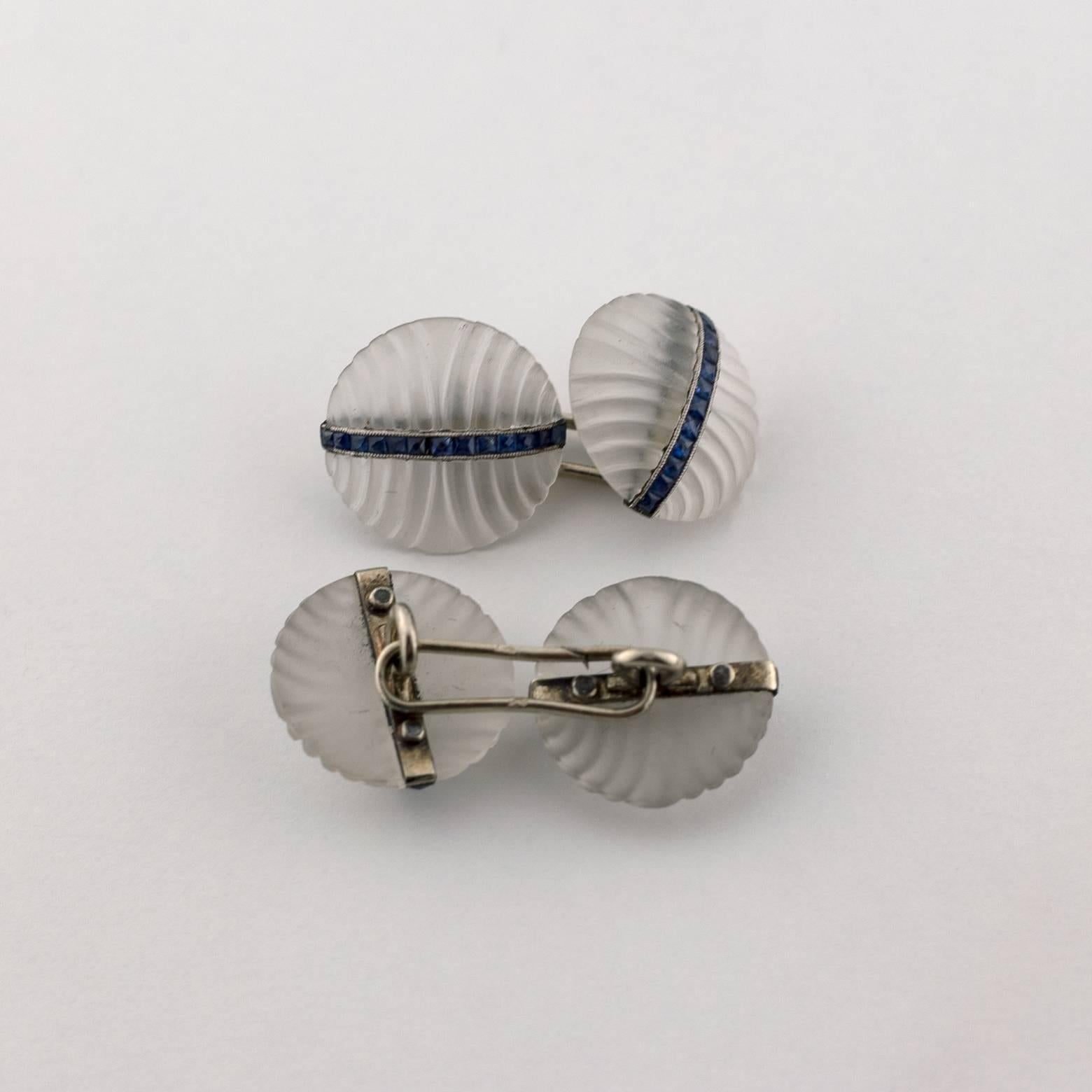 Gifts for him or her ! These cufflinks from the 1920's are stunning with a band of blue sapphires set in 18k white gold. Stunning simplicity... these cufflinks would be a wonderful gift for a man or a woman. They are French made, mark.