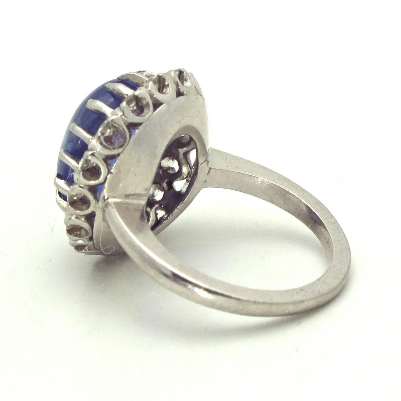 Modernist Blue Cabochon Sapphire Diamond Platinum Cluster Ring For Sale