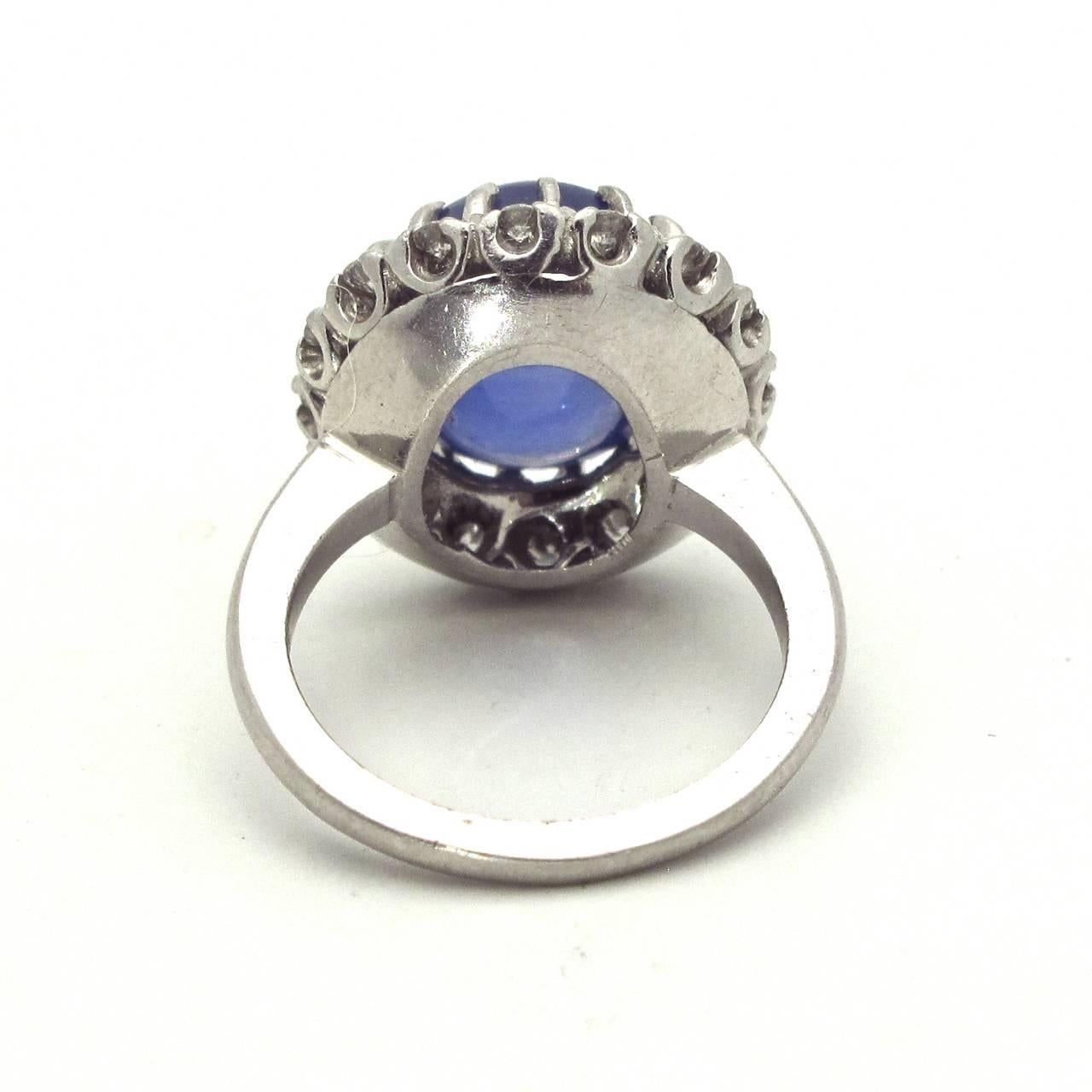 Blue Cabochon Sapphire Diamond Platinum Cluster Ring In Excellent Condition For Sale In Berkeley, CA