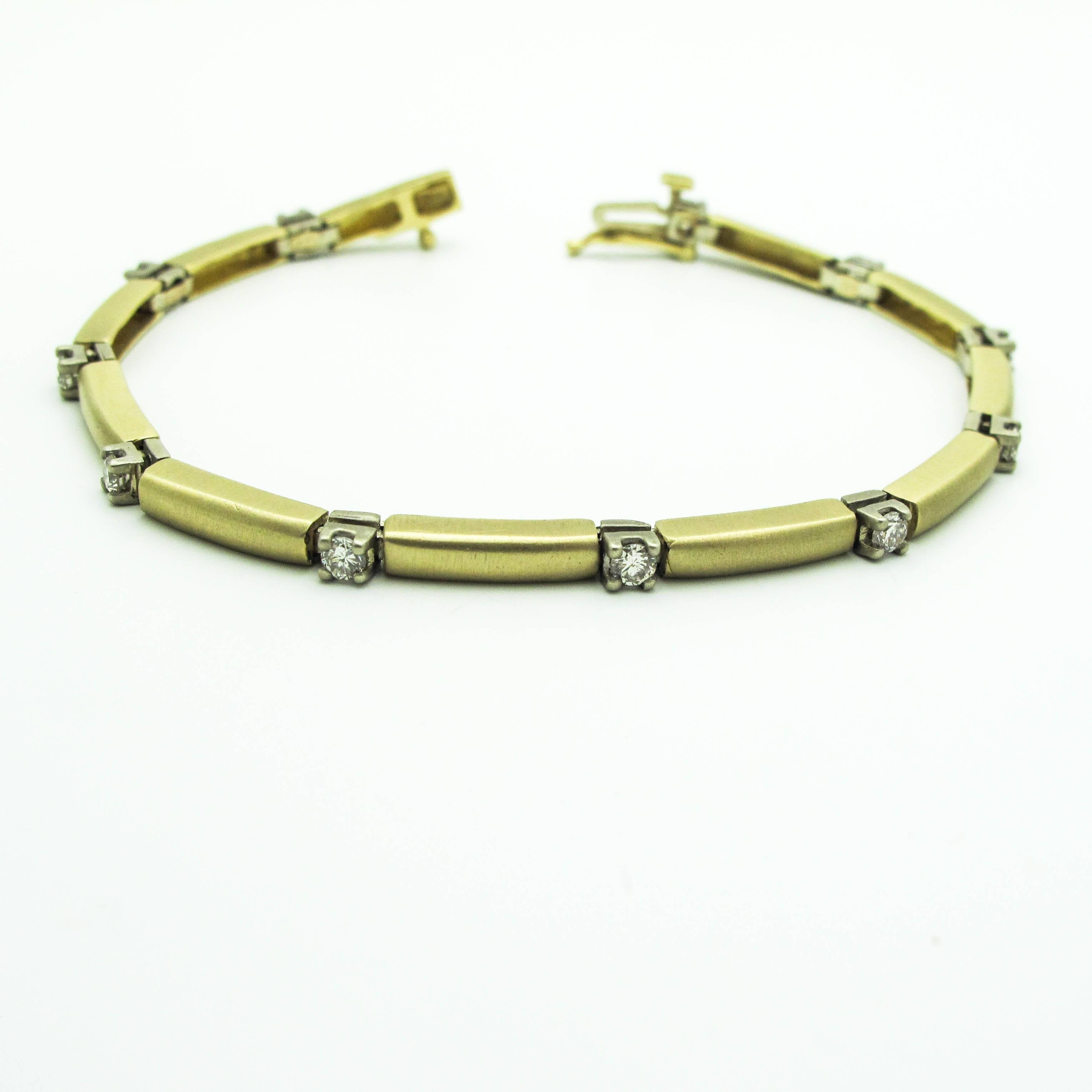 This beautiful tennis bracelet has a gorgeous satin finish and 11 Diamonds! Absolutely stunning, comfortable, and you can wear it with anything! 