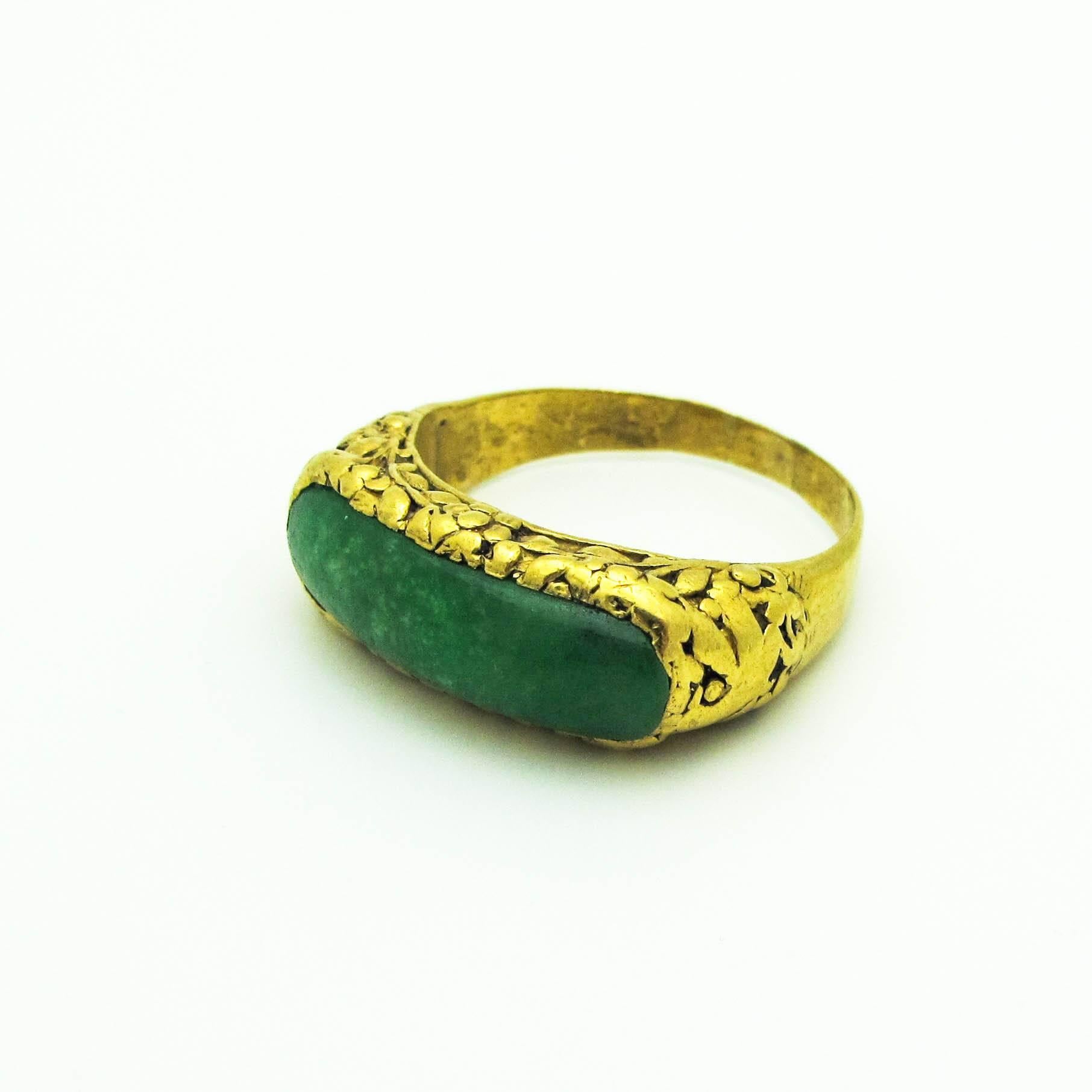 24k Gold ring with floral engravings on side. back of ring stamped TINFOOK 24k. Curved jade bar pendant, size 9