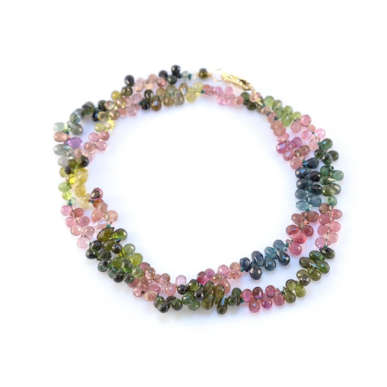 Pink, Yellow, Blue, and Green Tourmaline Briolettes- oh my! This fascinating necklace is lightweight, intricate and full of color. The tourmaline briolettes are rich and luscious and absolutely dazzle! It's comfortable and the alternating colors are