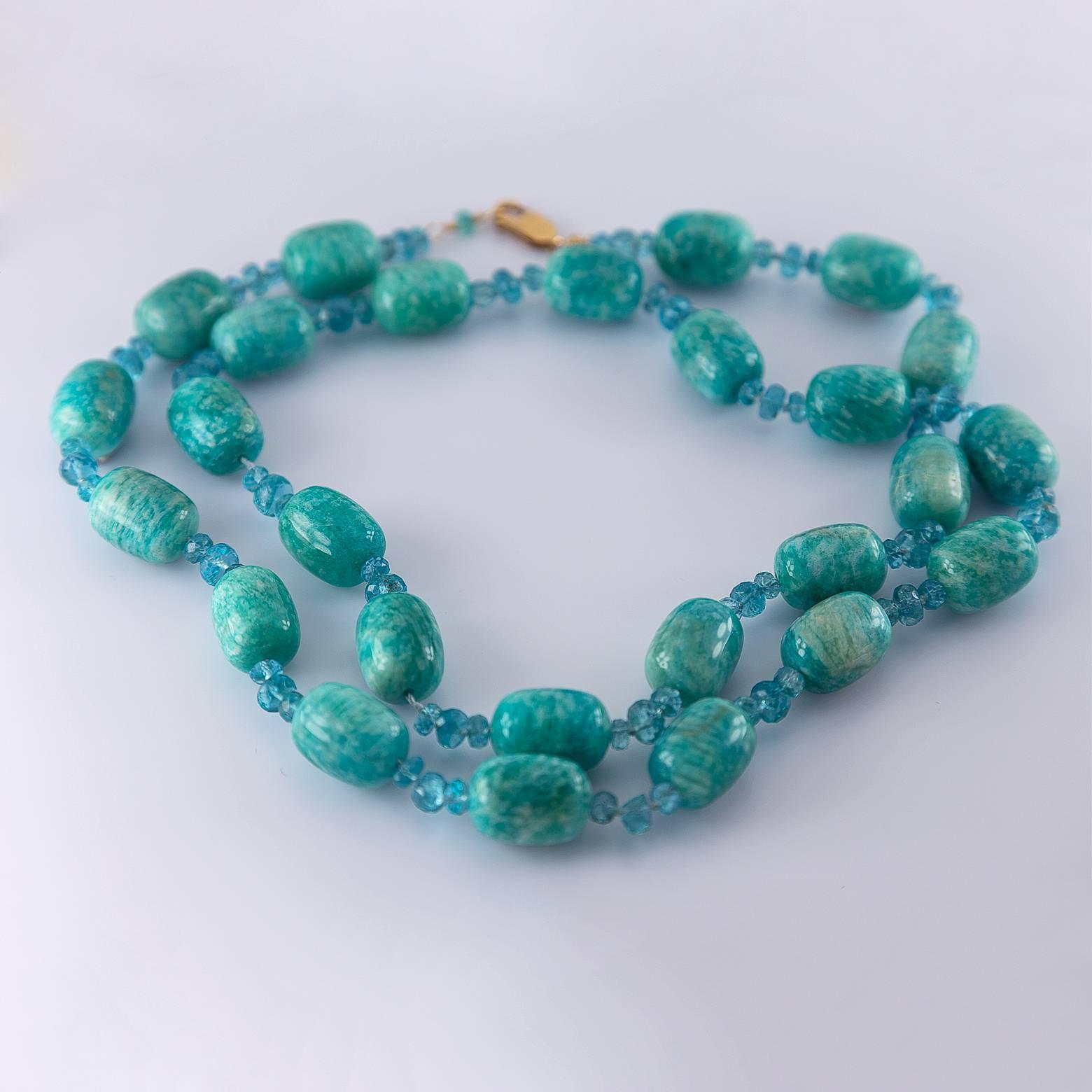 This amazonite and apatite necklace is hand-made by our jewelers in our workshop in our San Francisco Bay Area location. The pieces are large and have a substantial weight to them. The blues and greens are bright, cheerful, and beautiful with a