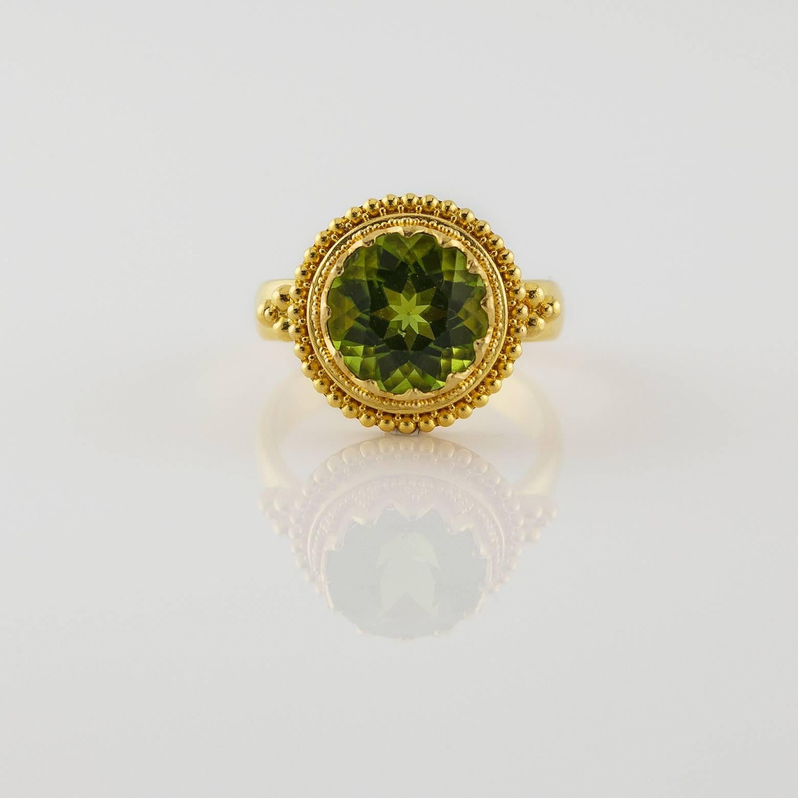 This stunning and intricately designed ring is full of detail and character. The quality of the stone is diivne and sparkles in every direction. It's classy and modern with an ancient and antique feel to it. Approximately size 6.75