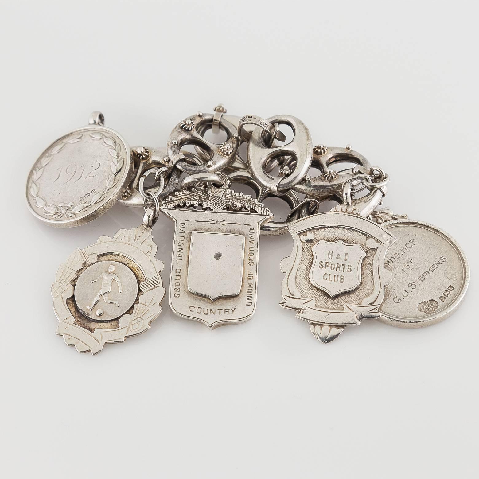 Victorian Sterling Silver Charm Bracelet In Excellent Condition In Berkeley, CA