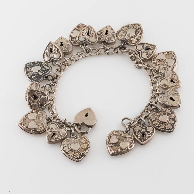 Antique sterling silver Heart Charm Bracelet For Sale at 1stdibs