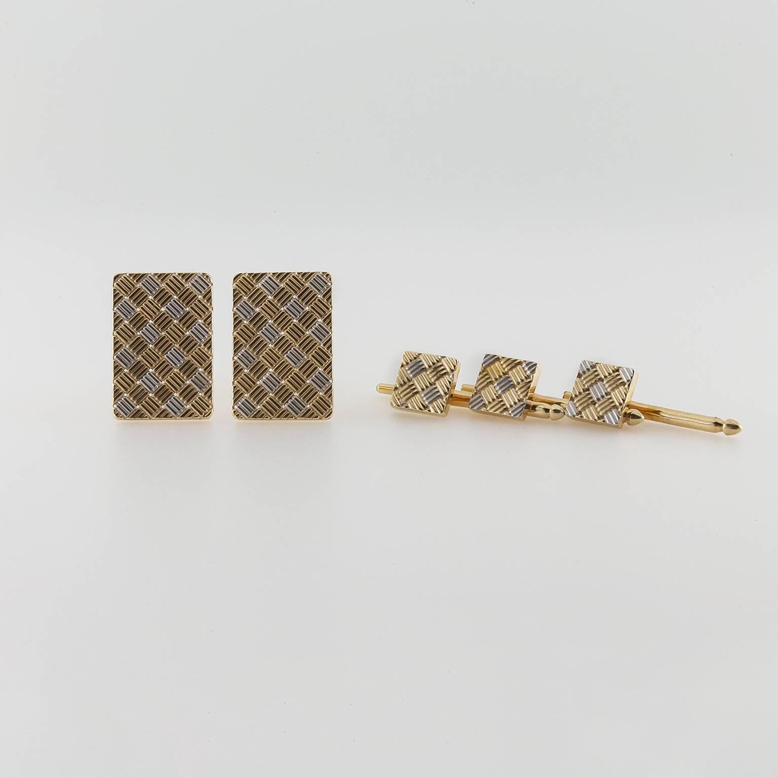 These cuff links create a profound and austere look with platinum and gold cross hatching that almost look woven. They add class to any outfit and the design is delicately mesmerizing. The set is can be worn on a tuxedo with all five pieces or the