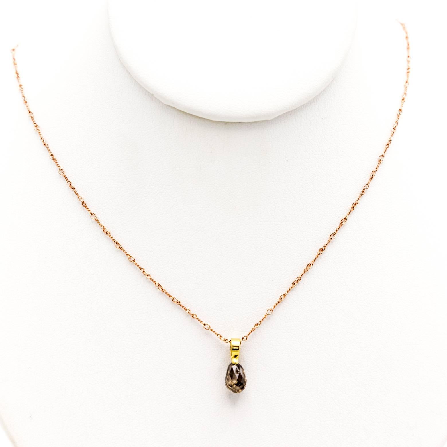 This sparkly and stunning deep Champagne Cognac Coffee color diamond briolette pendant hangs beautifully from 18K Yellow Gold. Absolutely magnificent with light reflections dancing and singing around your neck. Approximately 2.20 carats and