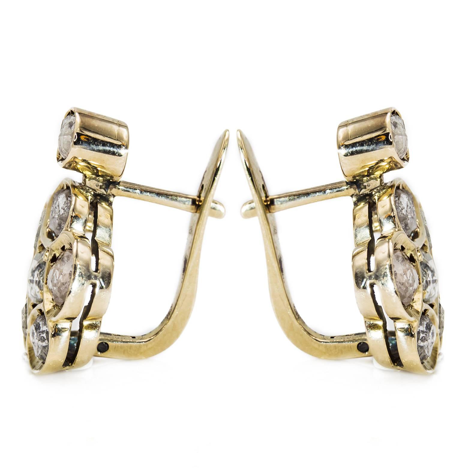 These gorgeous dazzling rose-cut diamond lever-back earrings are simply magnificent! Approximately 3.5 carats in total weight these beauties sparkle. Set in a beautiful shade of 12K Yellow gold where the bezel catches and reflects light and enhances