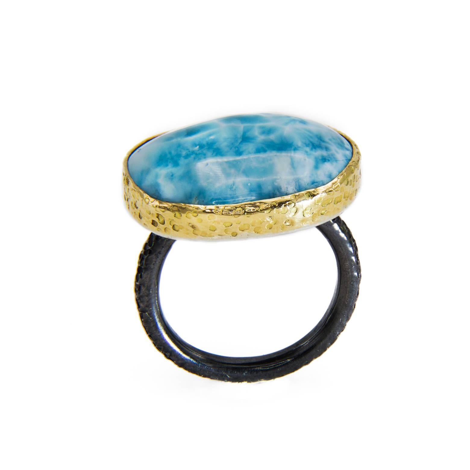 Caribbean ocean swirls and sky blue summer clouds dance in this gorgeous larimar ring. Your imagination is fancied and your daydreams expand as you adorn yourself in paradise. Larimar is said to assist in self expression, patience, acceptance,