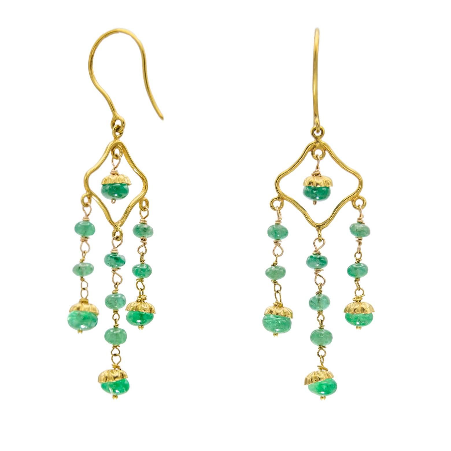 These earrings are light and airy. The emeralds are accented in a beautiful balance of gold and deep green. They are very popular now in the style of 'Bohemian'. These are the perfect balance of city meets beach.