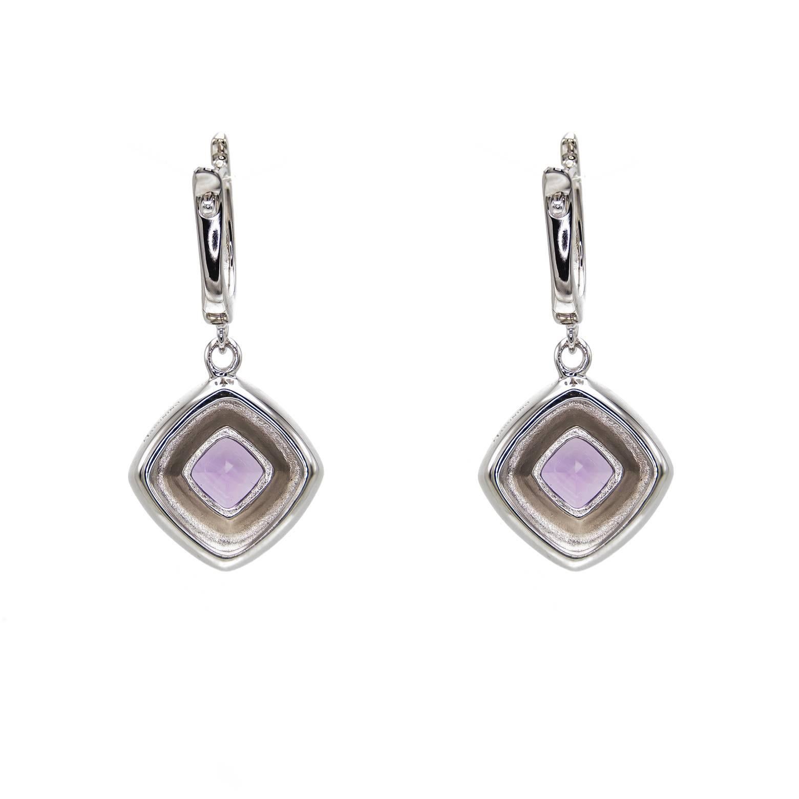 These brilliant bright square amethyst earrings dangle and swing with a lovely lever-back. The weight is substantial and the look is clean and elegant. A satin finish in the sterling silver and a beautiful color of purple amethyst. 