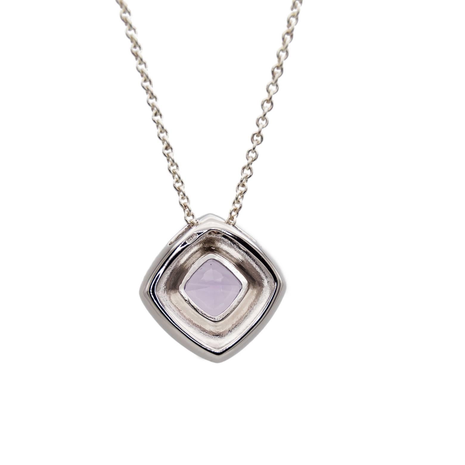 Stunning and elegant this bright purple rose-cut amethyst pendant sings with a voice of clarity. A smooth design and symmetrical in every way this piece can easily be worn everyday. Chain sold separately. We have matching earrings if you are
