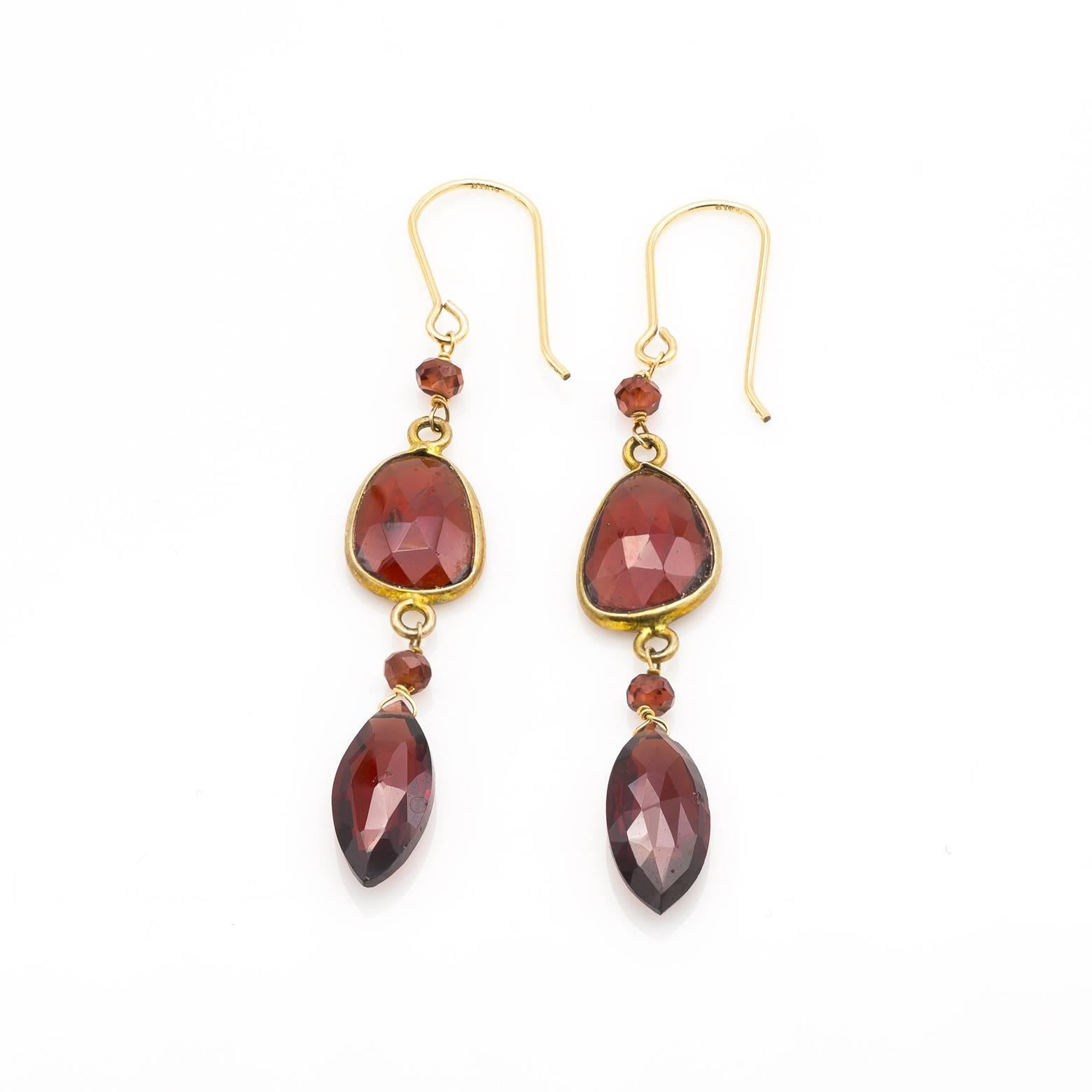 Stunning shades of cinnamon garnet light up these gorgeous earrings in the January birth stone. All beads faceted reflect and create elegance to dress up any outfit. Easily worn with great style these beautiful garnet earrings are a great addition