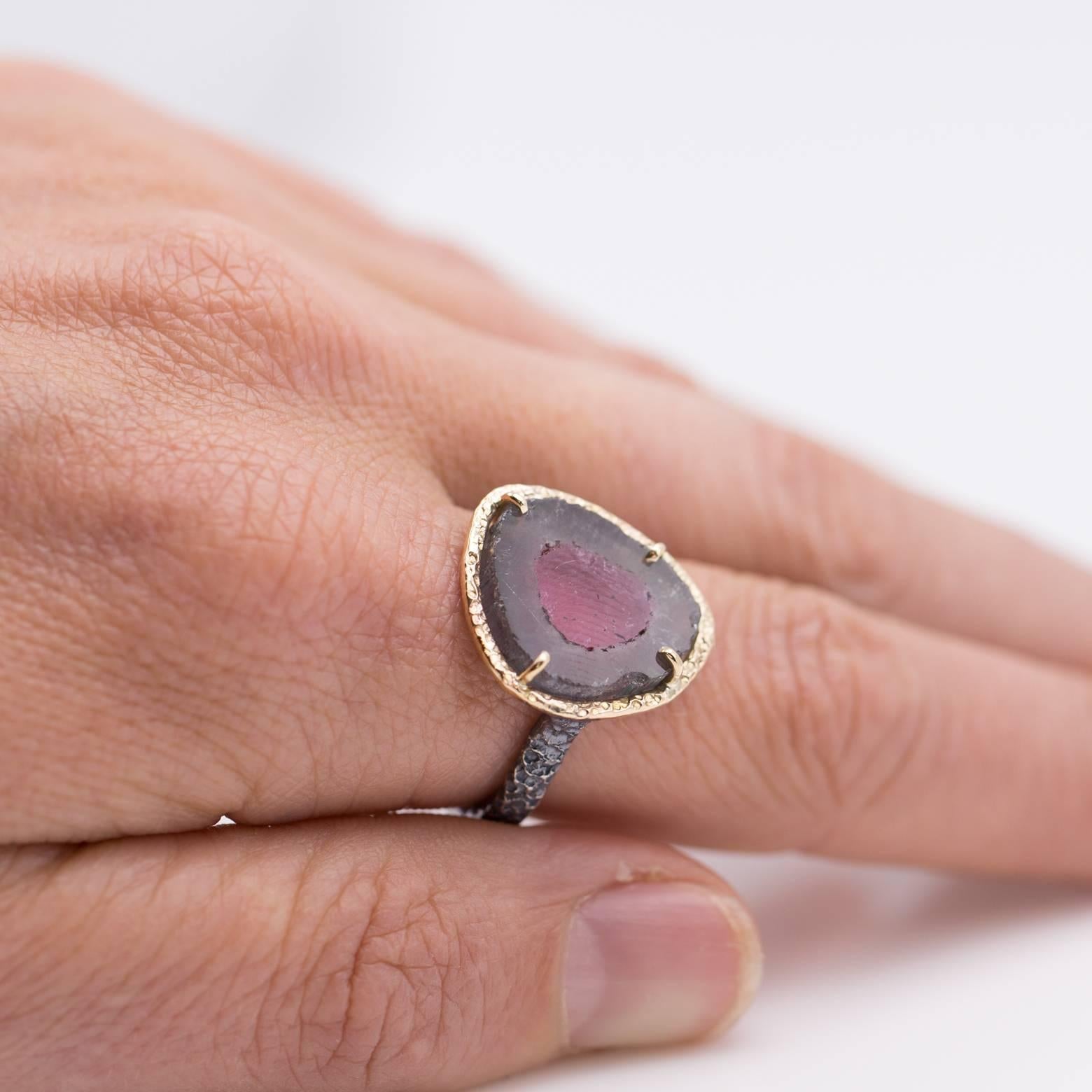 This one of a kind triangle watermelon tourmaline slice ring is set in 14K yellow gold and oxidized sterling silver giving it that beautiful two-toned look that goes great with just about everything! Handmade in the San Francisco Bay Area this