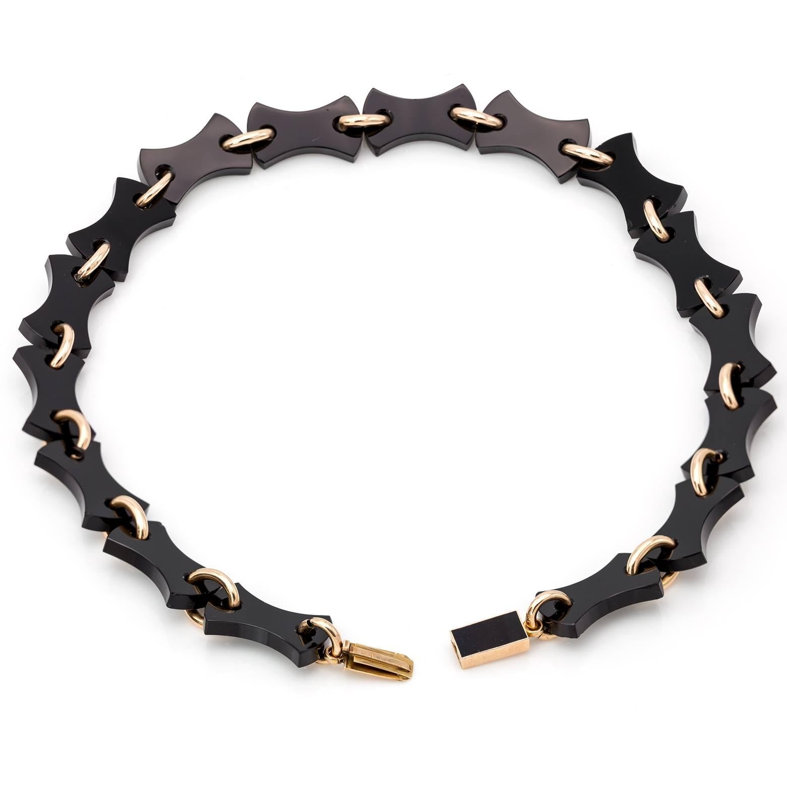 Made popular by Queen Victoria during her time of mourning this black onyx necklace is linked together with rose gold links and shines bright with reflective sheen. Made around the 1870's and in excellent condition. 