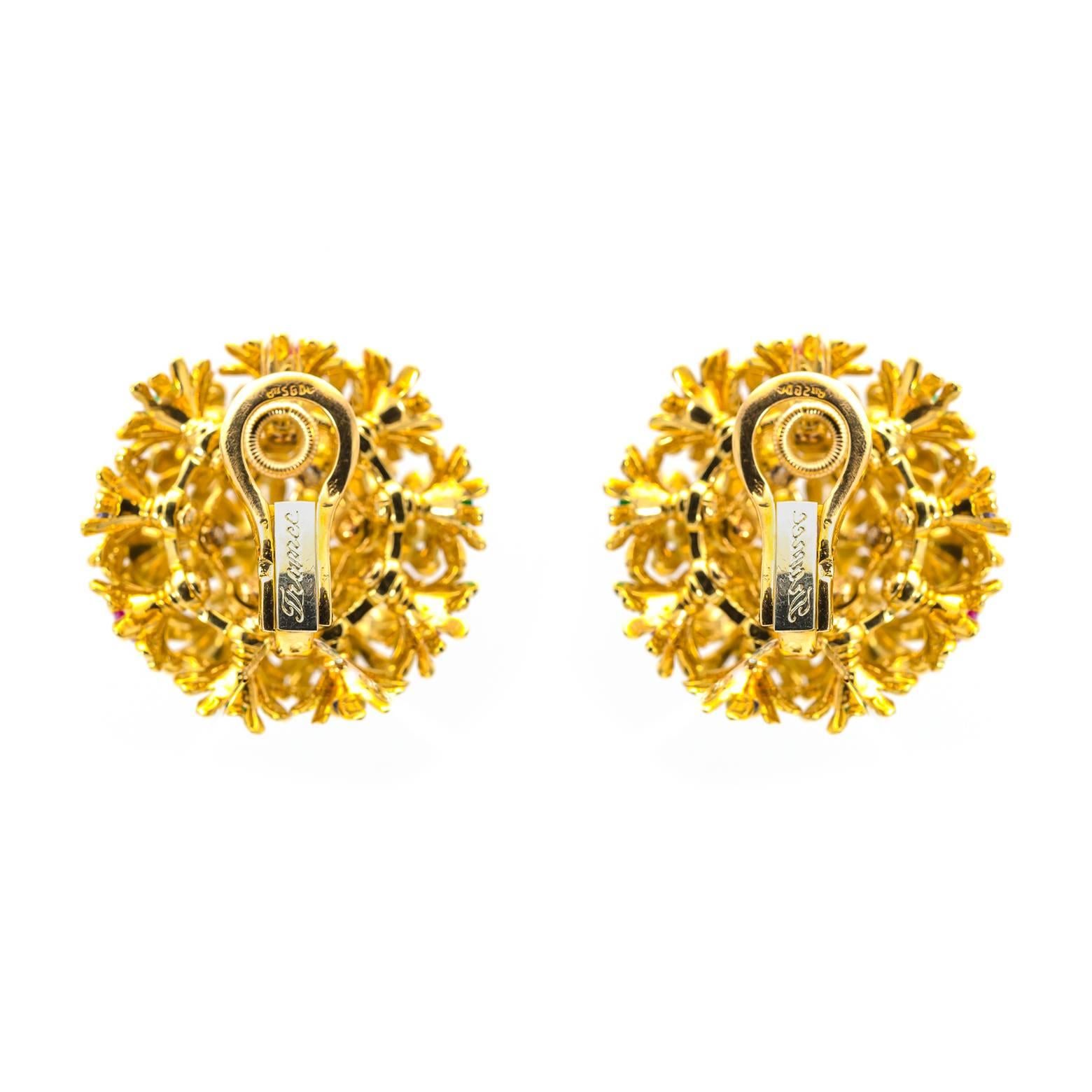 Clip-on earrings in 18K yellow gold and platinum. Traditional 'En Tremblant' creates a lovely movement that sparkles and shines with bright white diamonds, sapphires, emeralds, and rubies. Made like for the Place Vendome, French stamp for gold and
