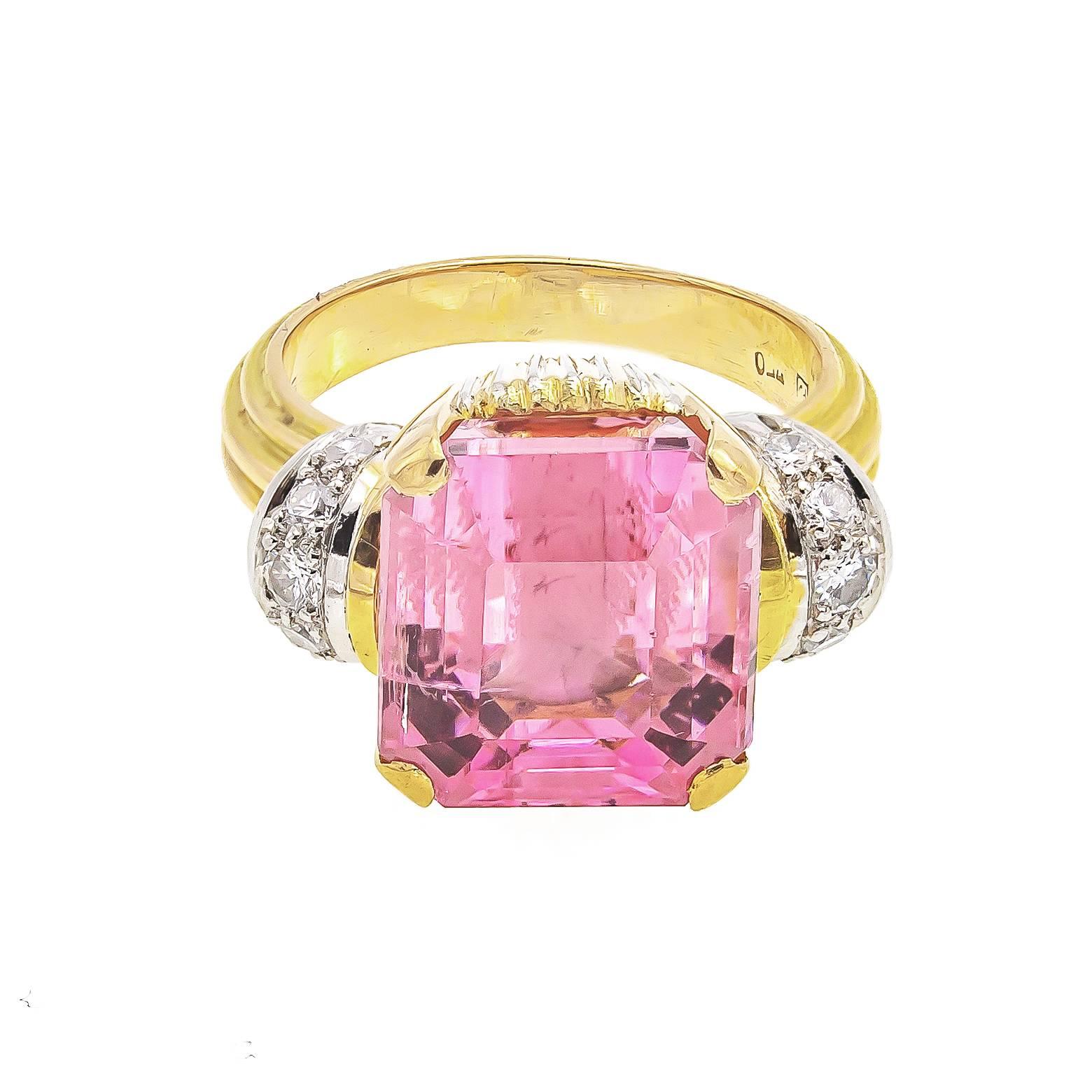 Eleven carats of glamorous pink tourmaline! Iconic of the 1950's with big bright femininity, this era was not afraid to spend and show their fashion. A stunning candy-like pink tourmaline cushion ring, faceted, detailed and gorgeous! The accent