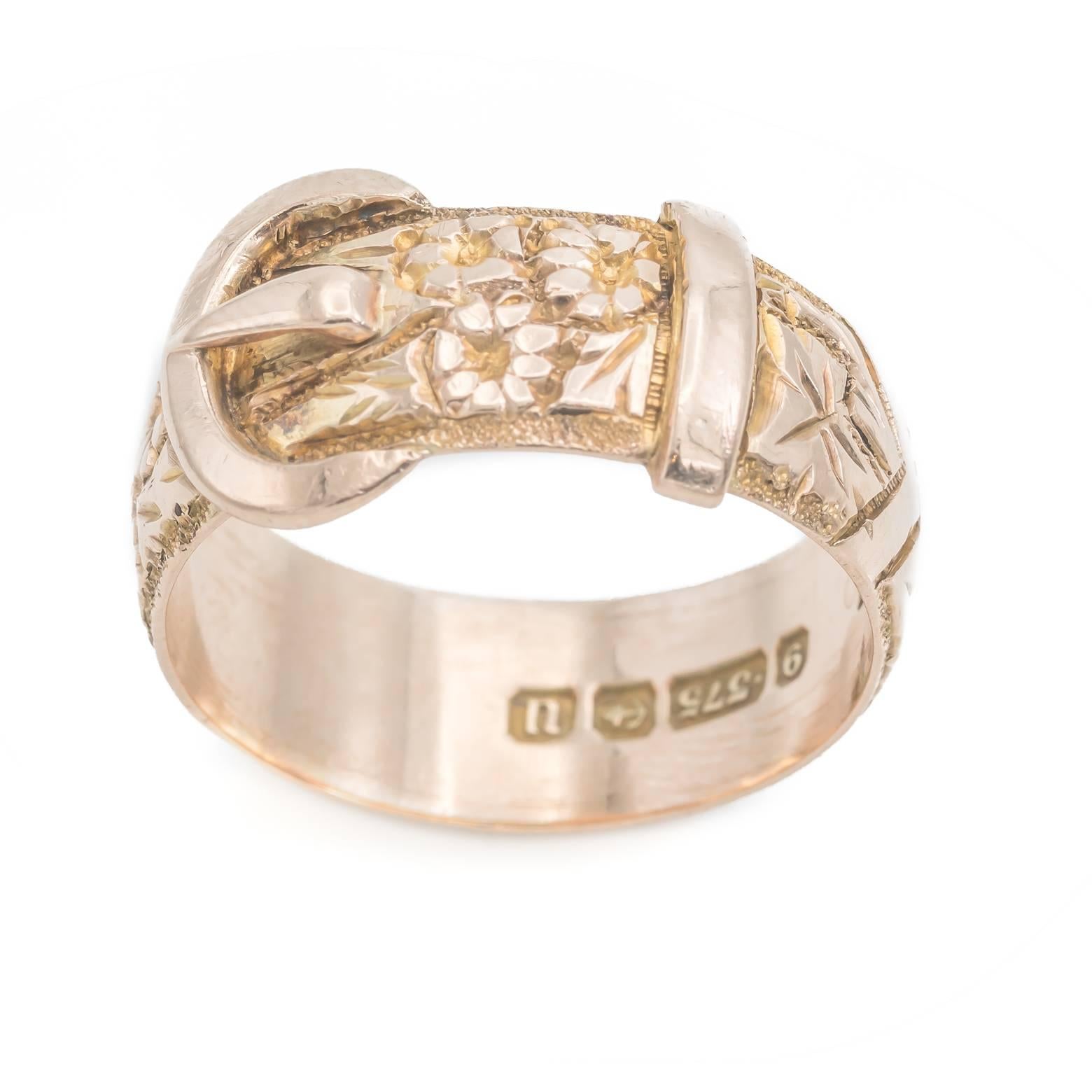 Made in 1919 this 9K gold ring is in impeccable shape and has a rosy color to the Gold. An antique belt ring that has exquisite detail with engraved flowers and leaves. Made in Birmingham, size 9.5