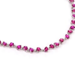 Bracciale tennis con rubini non trattati termicamente da 6,16 carati e diamanti, realizzato in platino