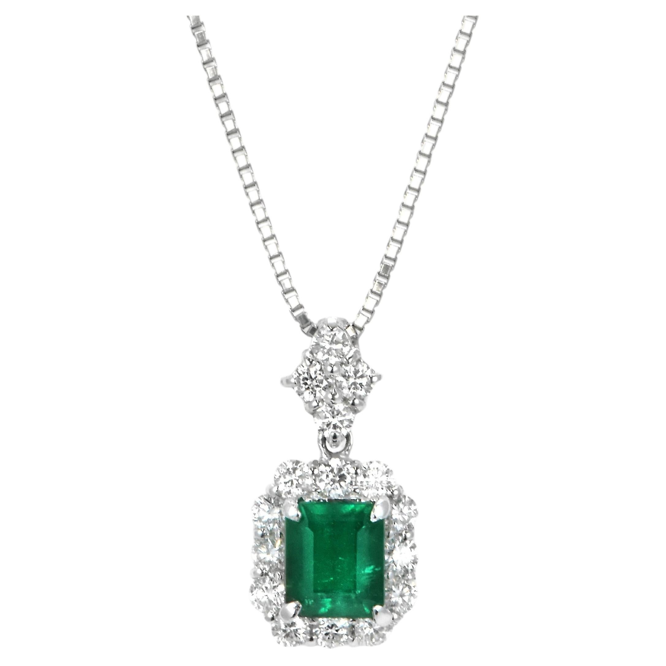 Colgante de platino con esmeralda colombiana natural de 0,79 quilates y diamantes