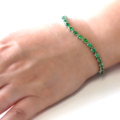 5.71 Carat Natural Pear-Shaped Emerald Tennis Bracelet Made in Platinum