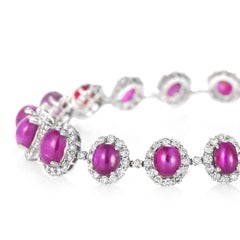 25.13 Carat Natural Burmese Star Rubies and Diamonds Bracelet Made in Platinum