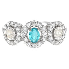 0.23 Carat Natural Brazilian Paraiba Tourmaline & Diamond Ring Made in Platinum