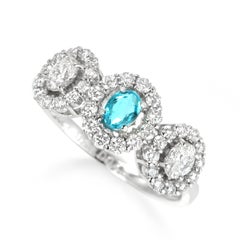 0.23 Carat Natural Brazilian Paraiba Tourmaline & Diamond Ring Made in Platinum
