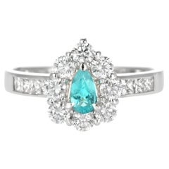 0.19 Carat Natural Brazilian Paraiba Tourmaline & Diamond Ring Made in Platinum