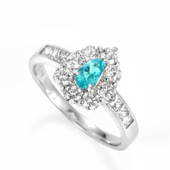 0.19 Carat Natural Brazilian Paraiba Tourmaline & Diamond Ring Made in Platinum