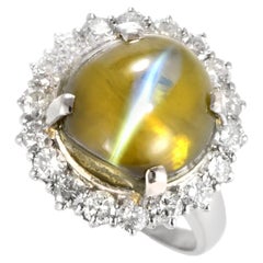 14.00 Carat Natural Cat's Eye Chrysoberyl and Diamond Ring Made in Platinum