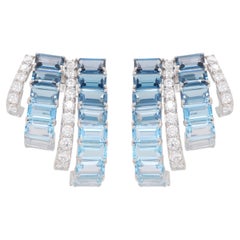 Boucles d'oreilles créoles « Drift » en or blanc 14 carats, avec topaze bleue de 5 x 3 mm et diamants octogonaux