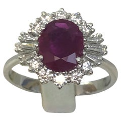 Anello con diamante e rubino in oro bianco 18 carati