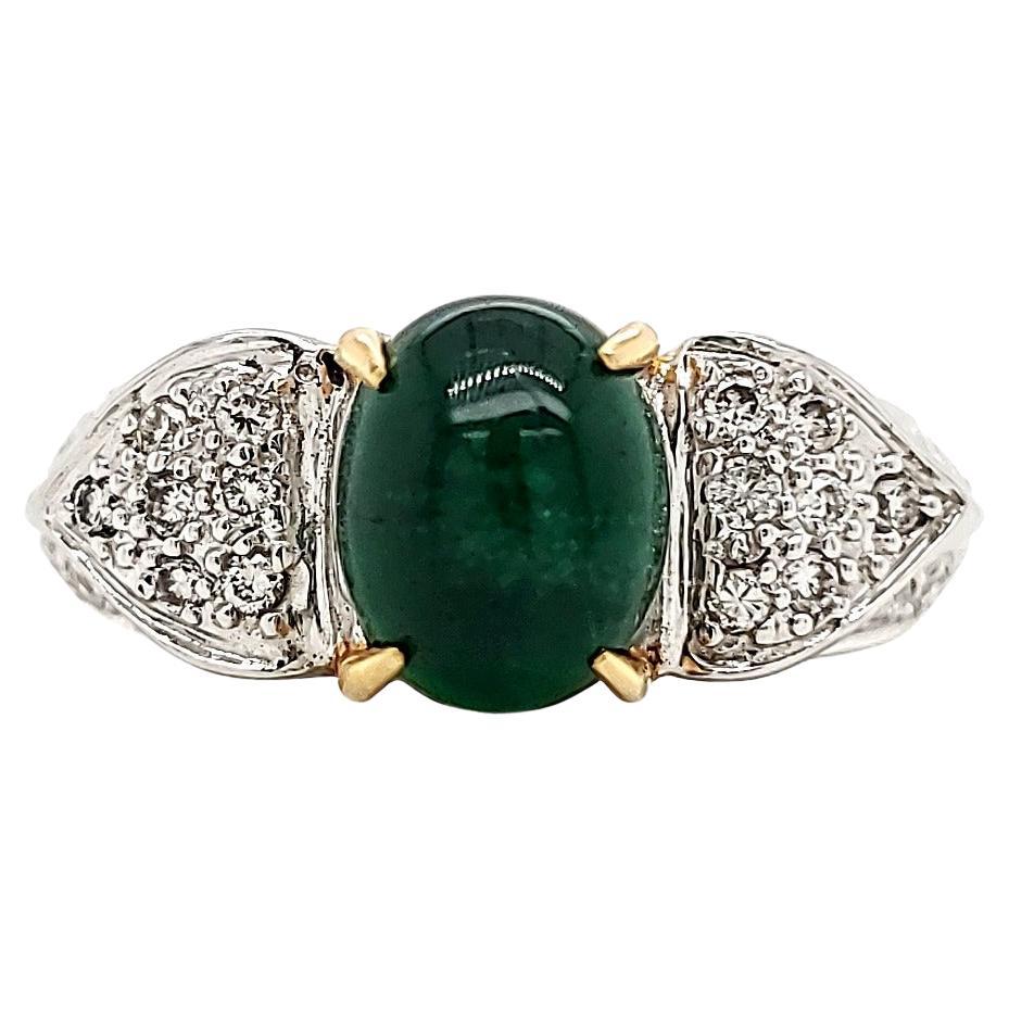 Emerald Cabochone Engagement ring with diamond studded gold planks.  For Sale