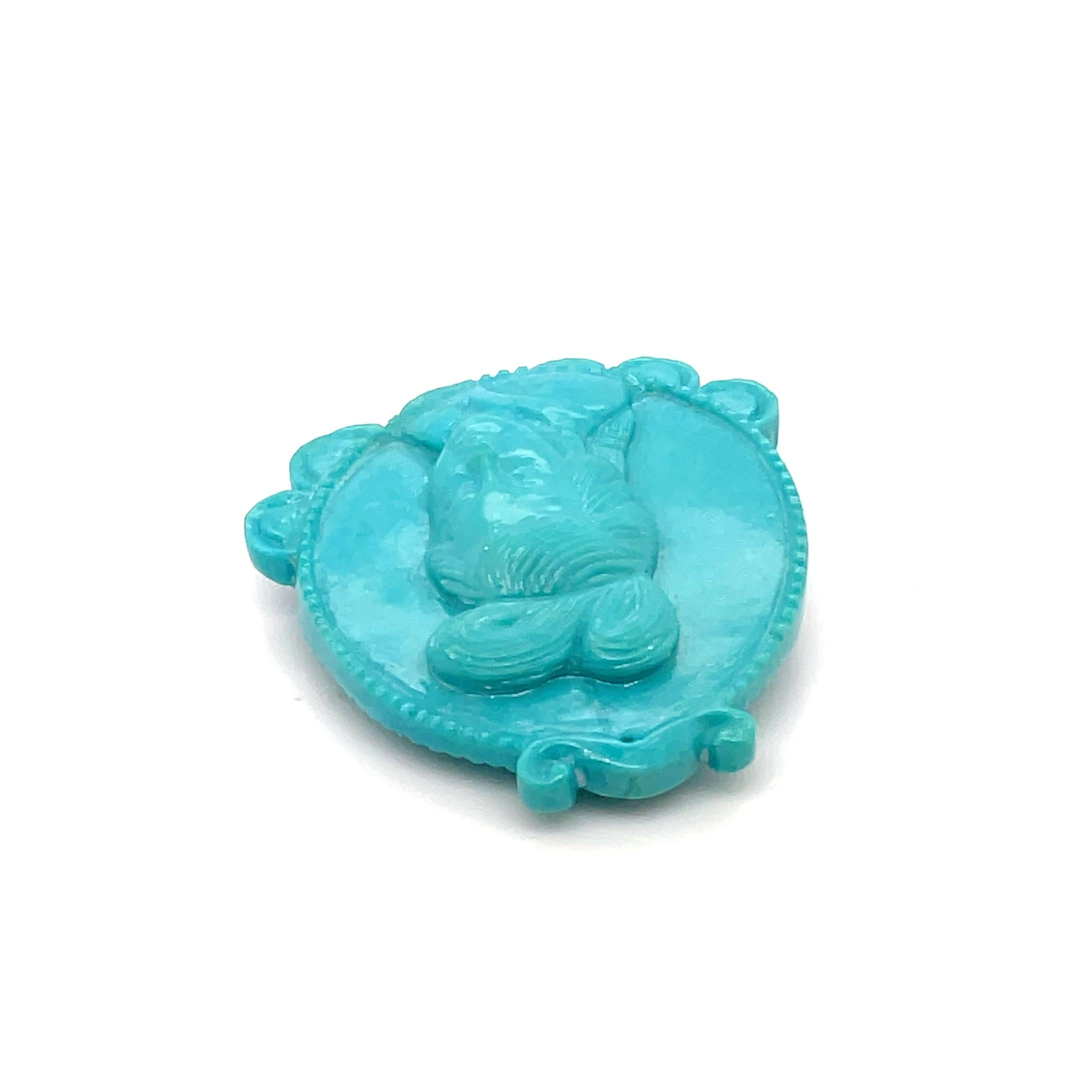 This stunning pendant showcases a beautifully carved lady's face, crafted from natural turquoise, weighing 39.16 carats. 

The intricate details bring out the elegance and charm of the design, making it a true statement piece.

Turquoise, known as a