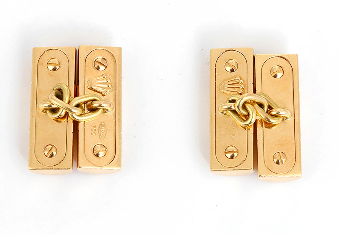 These are very rare 18k yellow gold genuine Rolex cuff links. These are the only one's we've ever seen! Cuff links are in the shape of Rolex President links and are signed.  Each link measures apx. 3/4-inch in length. Total weight is 33.3 grams.