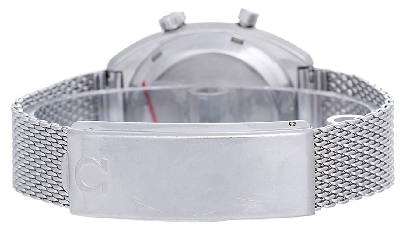 Manual winding; chronostop watch feature. Stainless steel case with single chronostop pusher; barely visible at the center of the crystal is the Omega symbol  (34mm x 38mm). Charcoal gray dial with stick markers.  The dial is turned 90 degrees