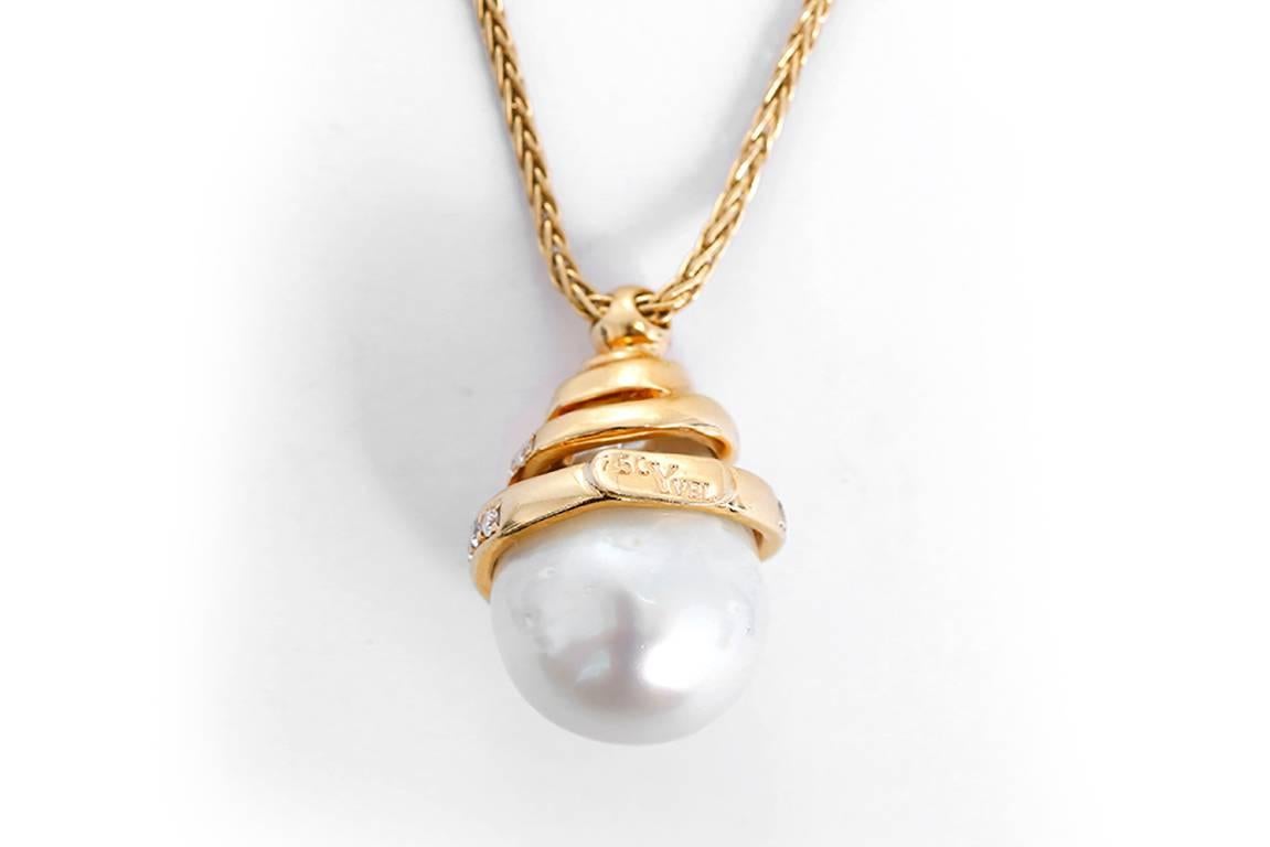 This amazing Yvel necklace features a Freshwater Pearl and diamond(apx. 0.33ct) pendant on an 18k yellow gold chain. Necklace measures apx. 16-inches in length and pendant measures apx. 7/8-inches in length. Total weight is 14.2 grams. Stamped