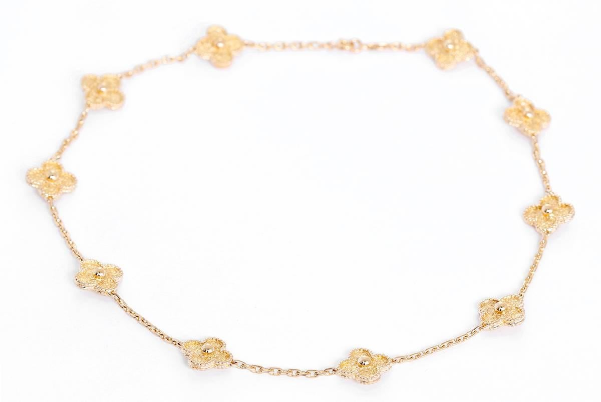This Van Cleef and Arpels necklace is a part of the Vintage Alhambra Collection. It features 10-iconic motifs in 18k yellow gold. Signed, 
