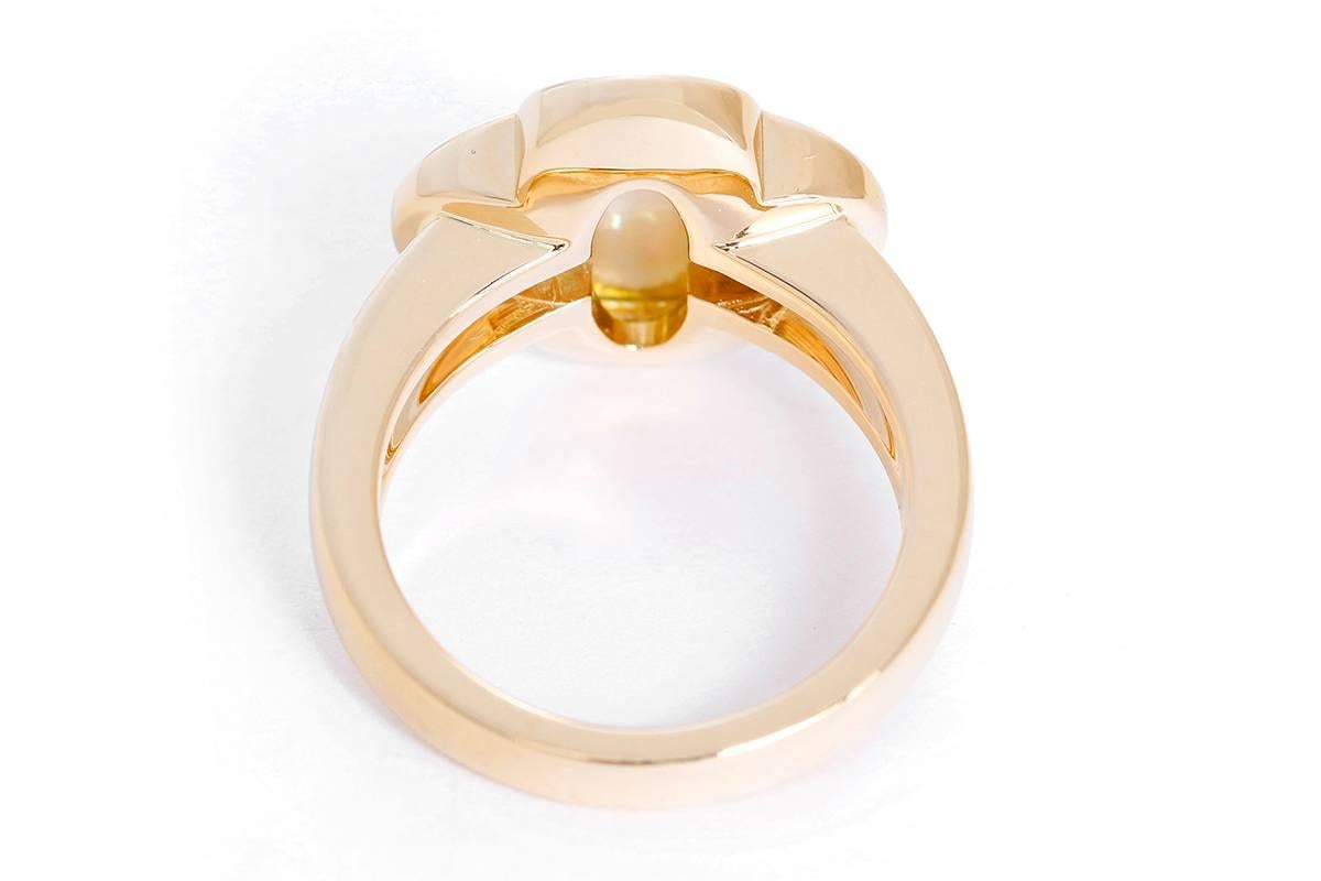 This Van Cleef & Arpels ring is a part of the Pure Alhambra collection and features a white mother-of-pearl set in 18k yellow gold. Total weight is 10.9 grams. Signed, "VCA 750 52 CL27847". Size 52 (US 6). Current Replacement Value:
