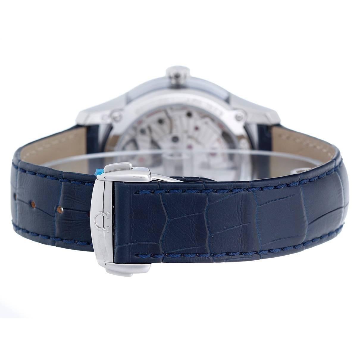 Automatic winding. Stainless steel case with exposition sides and back (41mm diameter). Blue dial with silver stick markers; date at 3 o'clock. Blue alligator strap band with stainless steel deployant buckle. Pre-owned with box and papers.

Ref