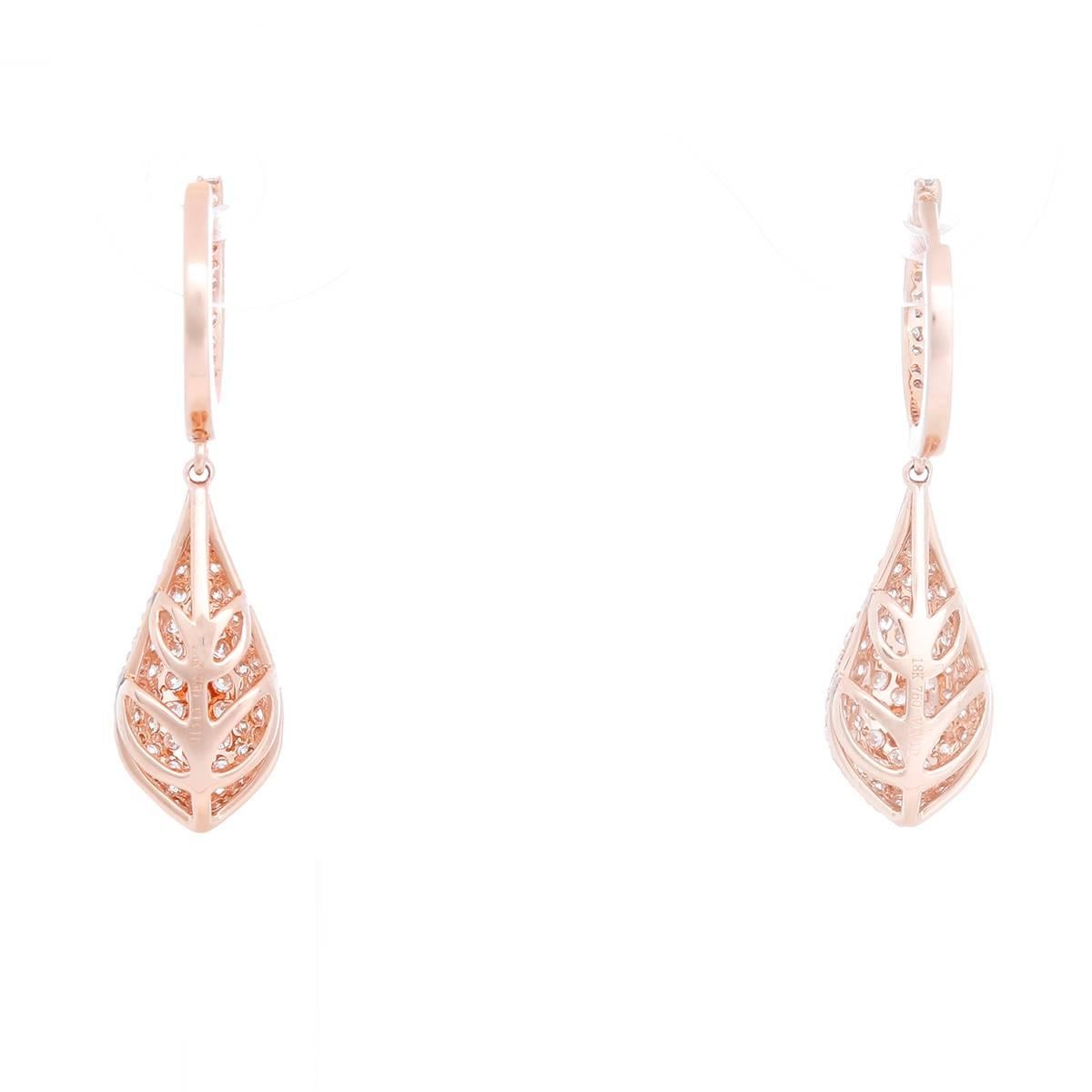 These amazing pave-set 1.39 ctw. diamond teardrop earrings are set in 18k rose gold. Earrings measure apx. 1-1/4 inches in length. Total weight is 3.7 grams.