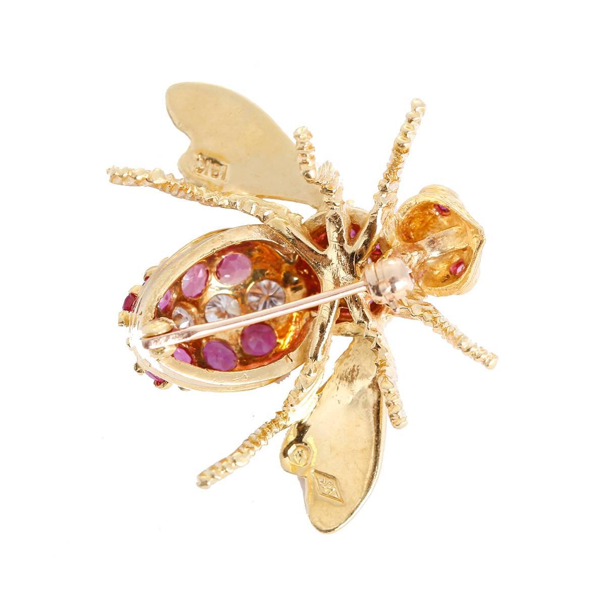 This amazing large bee pin features 2.3 ctw. (F-G Color and VS2-Clarity) of diamonds with fine quality rubies set in 18k yellow gold.  Total weight is 10.2 grams.Pin measures apx. 1-1/4 x 1-inch.  Hallmarked, HR and 18K.