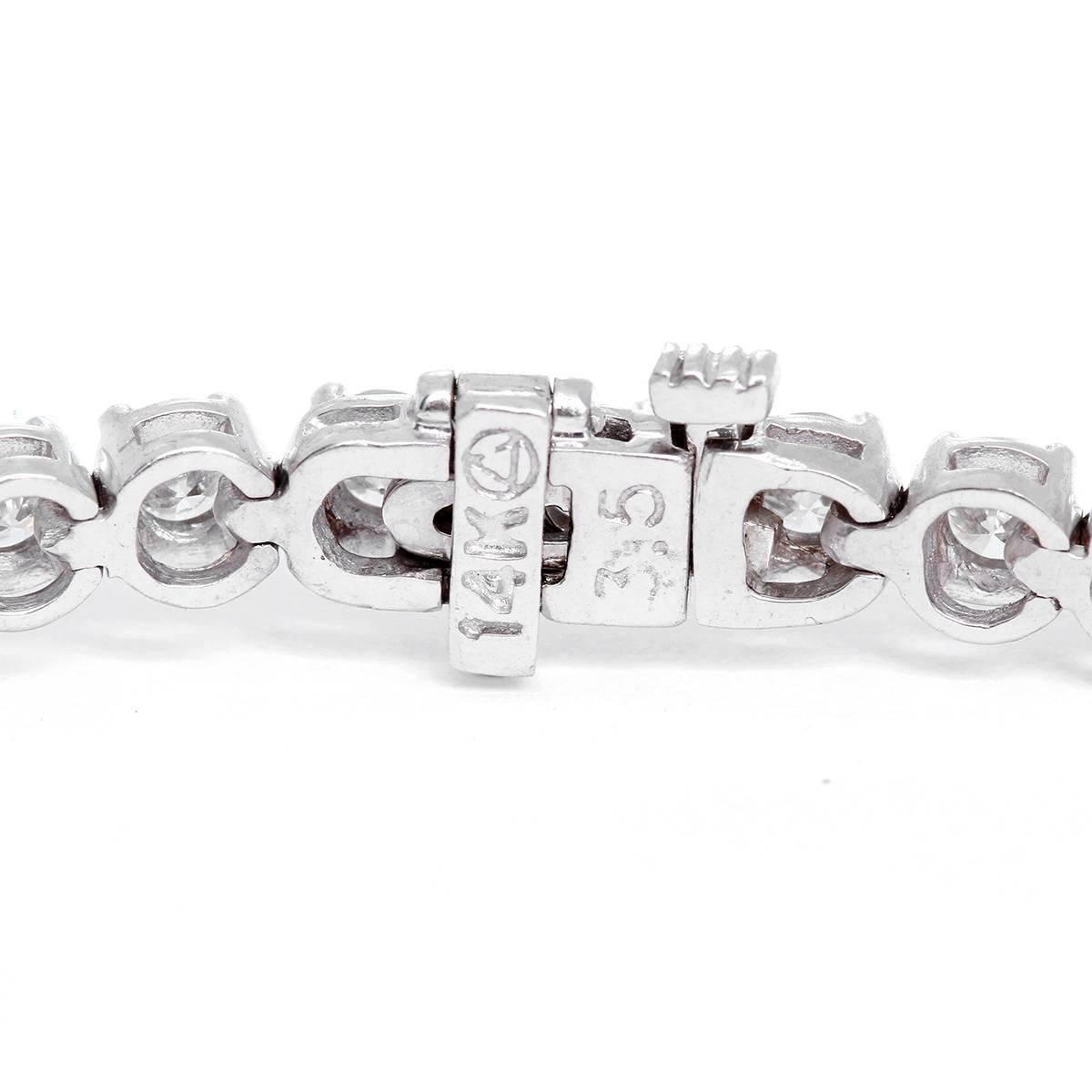 This beautiful bracelet features 6.02 carats of diamonds (HI-color, SI2-SI3 clarity) set in 14k white gold. Bracelet measures apx. 7-inches in length. Total weight is 15.1 grams.