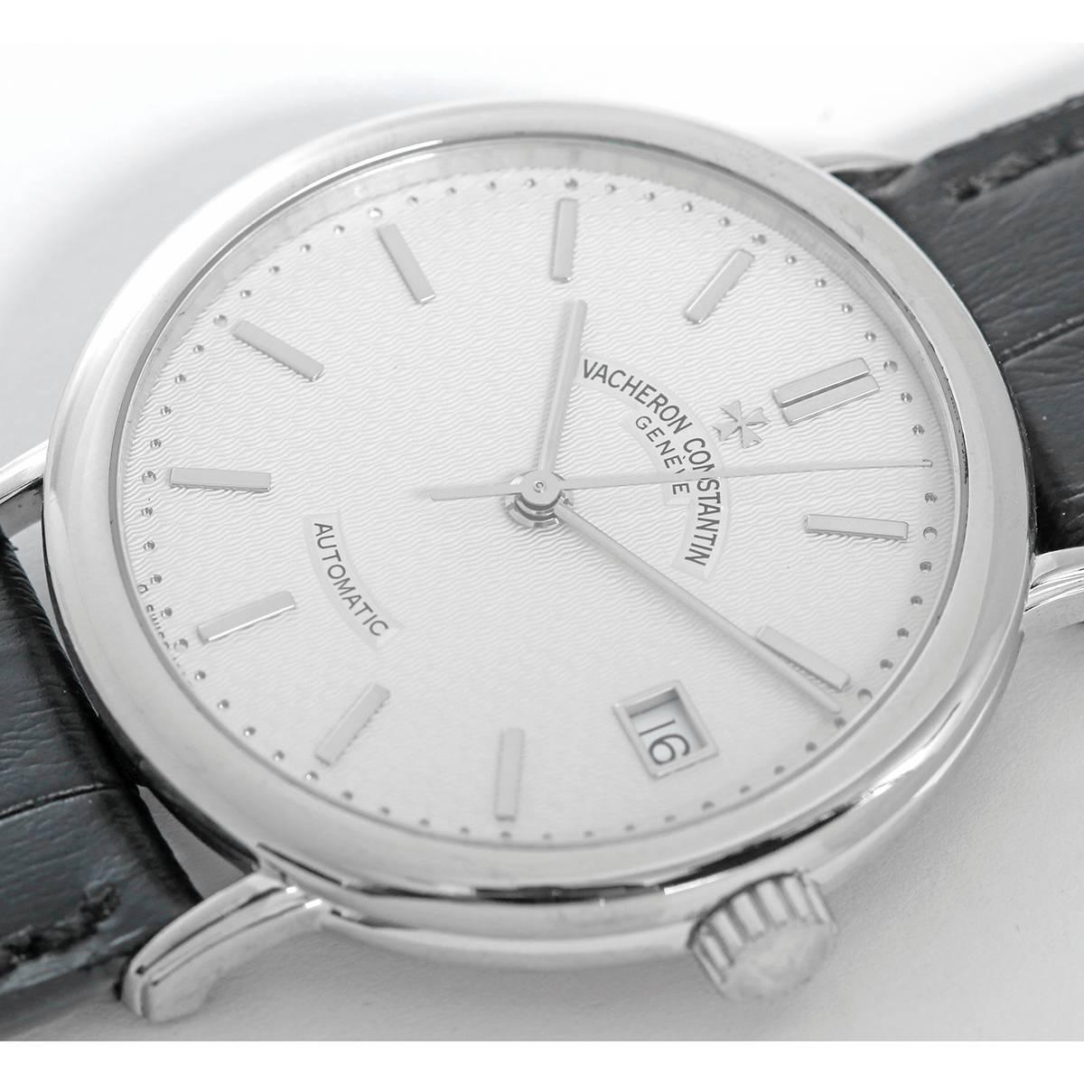 Automatic, self winding. 18K White Gold round smooth ( 36mm ). Silver guilloche pattern with applied gold indexes. Baton hands, 33 jewels; Date at 3 o'clock. Black crock strap with Vacheron Constantin buckle. Pre- owned with box and papers.