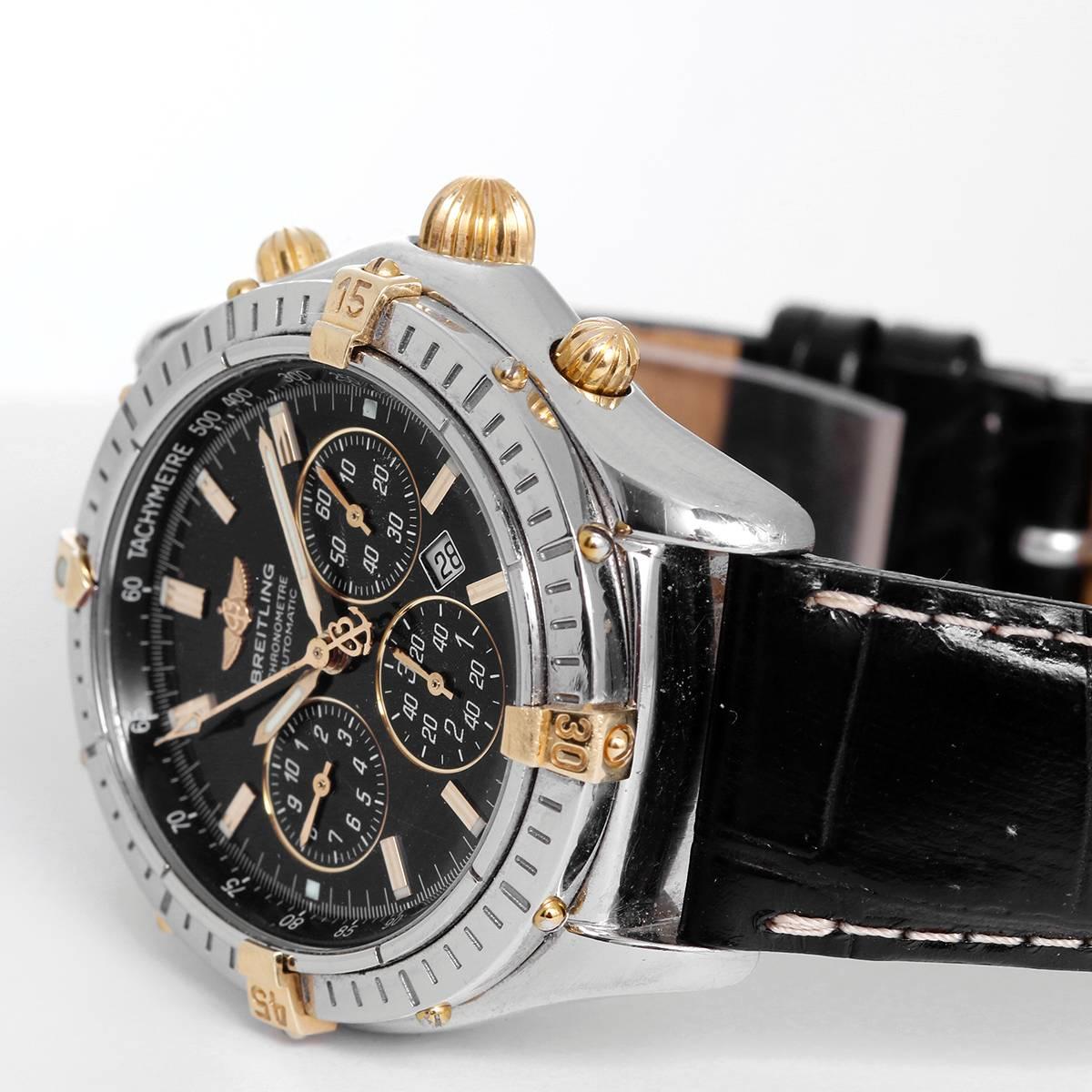 Breitling Shadow Flyback B35312 Men's Chronograph Watch B35312 -  Automatic winding chronograph with date. Stainless steel and 18k yellow gold case with rotating bezel (38mm diameter). Black dial with markers. Black strap band. Pre-owned with