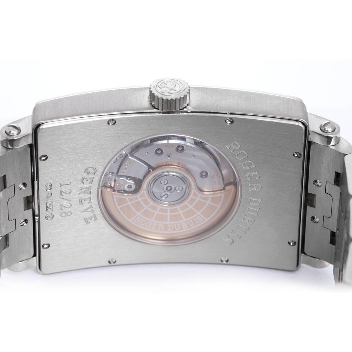 Roger Dubuis Much More 18k White Gold Men's Limited Edition Watch -  Automatic winding. 18k white gold case with diamond bezel (34mm x 46mm). Silvered dial with Roman numerals. Roger Dubuis 18k white gold bracelet. Pre-owned with box and papers. 