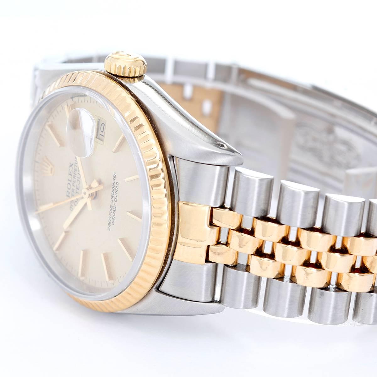 Rolex Datejust 2-Tone Watch  Jubilee Band 16233 -  Automatic winding, Quickset, sapphire crystal. Stainless steel case with 18k yellow gold fluted bezel (36mm diameter). Champagne dial with stick markers. Stainless steel and 18k yellow gold Jubilee