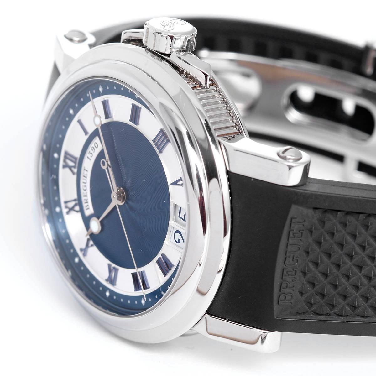 Breguet Marine Automatic Men's Watch Ref. 5817 -  Automatic Winding. Stainless Steel with fixed bezel; Crystal display back (39 mm). Blue Guilloche with silver hands and blue roman numerals dial; Big Date  at 6 o'clock. Black rubber strap with